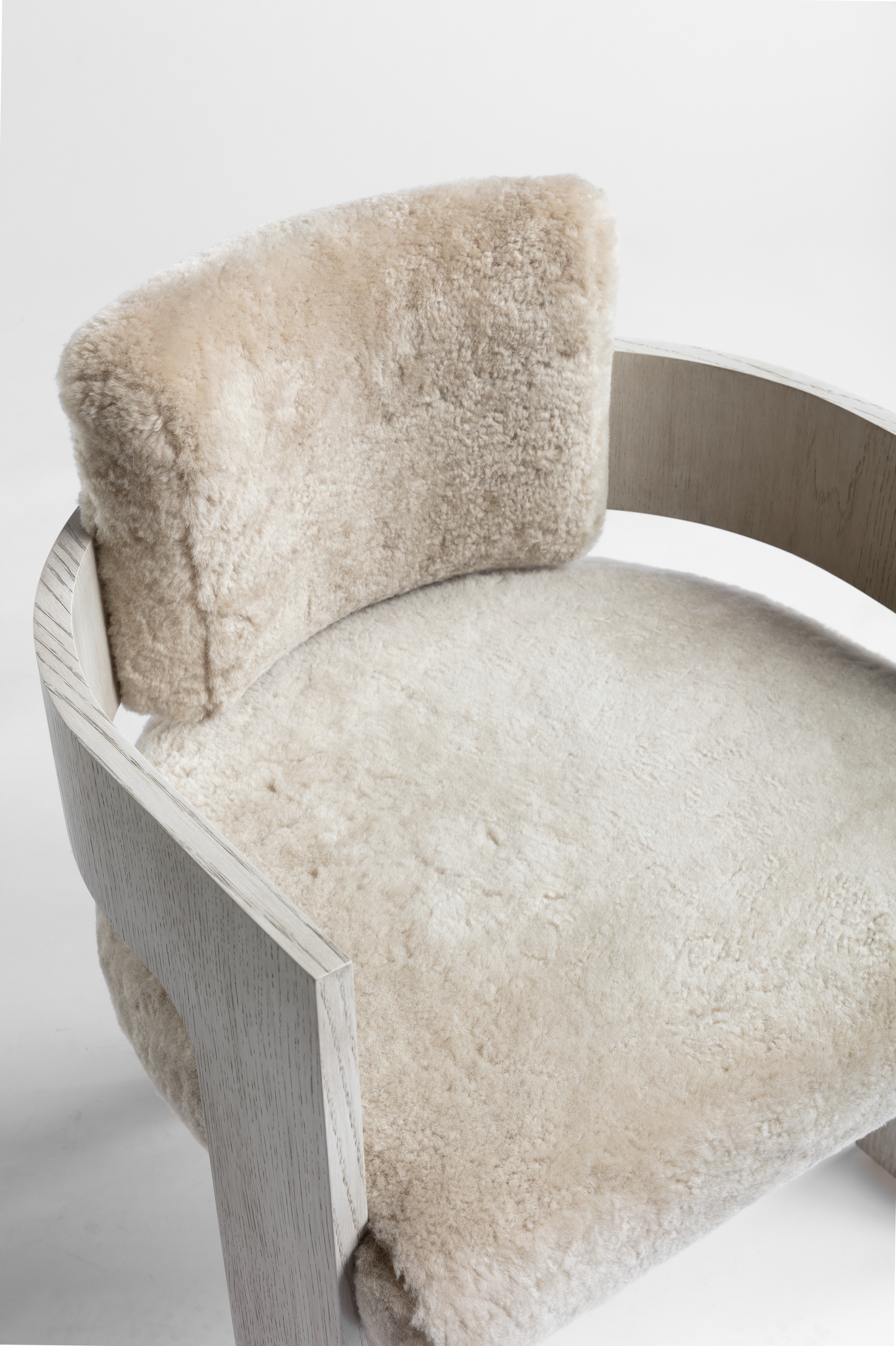 Shown in Sand Oak frame with Dusty Beige Shearling cushions