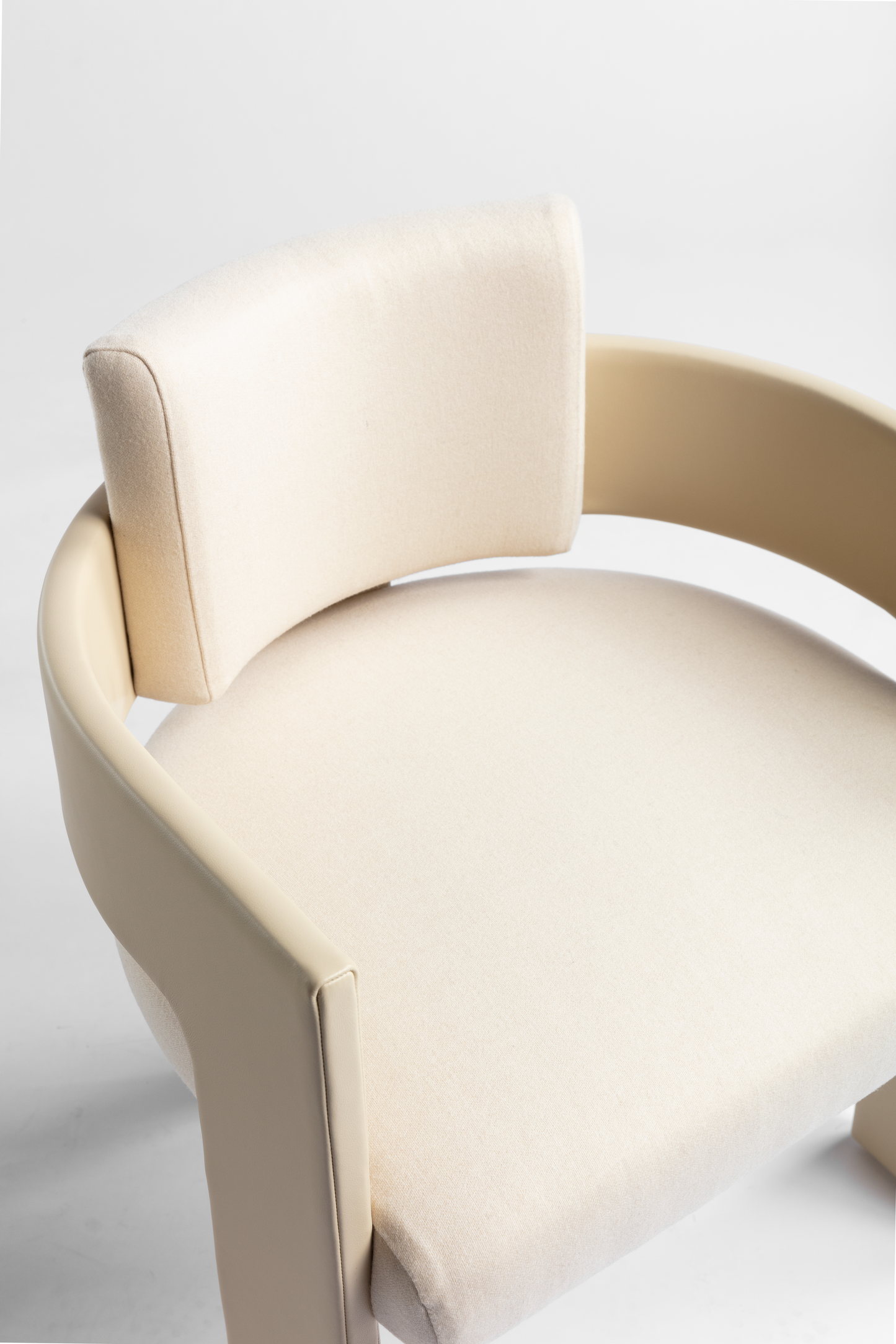 Shown in Almond Leather frame with Almond Wool cushions