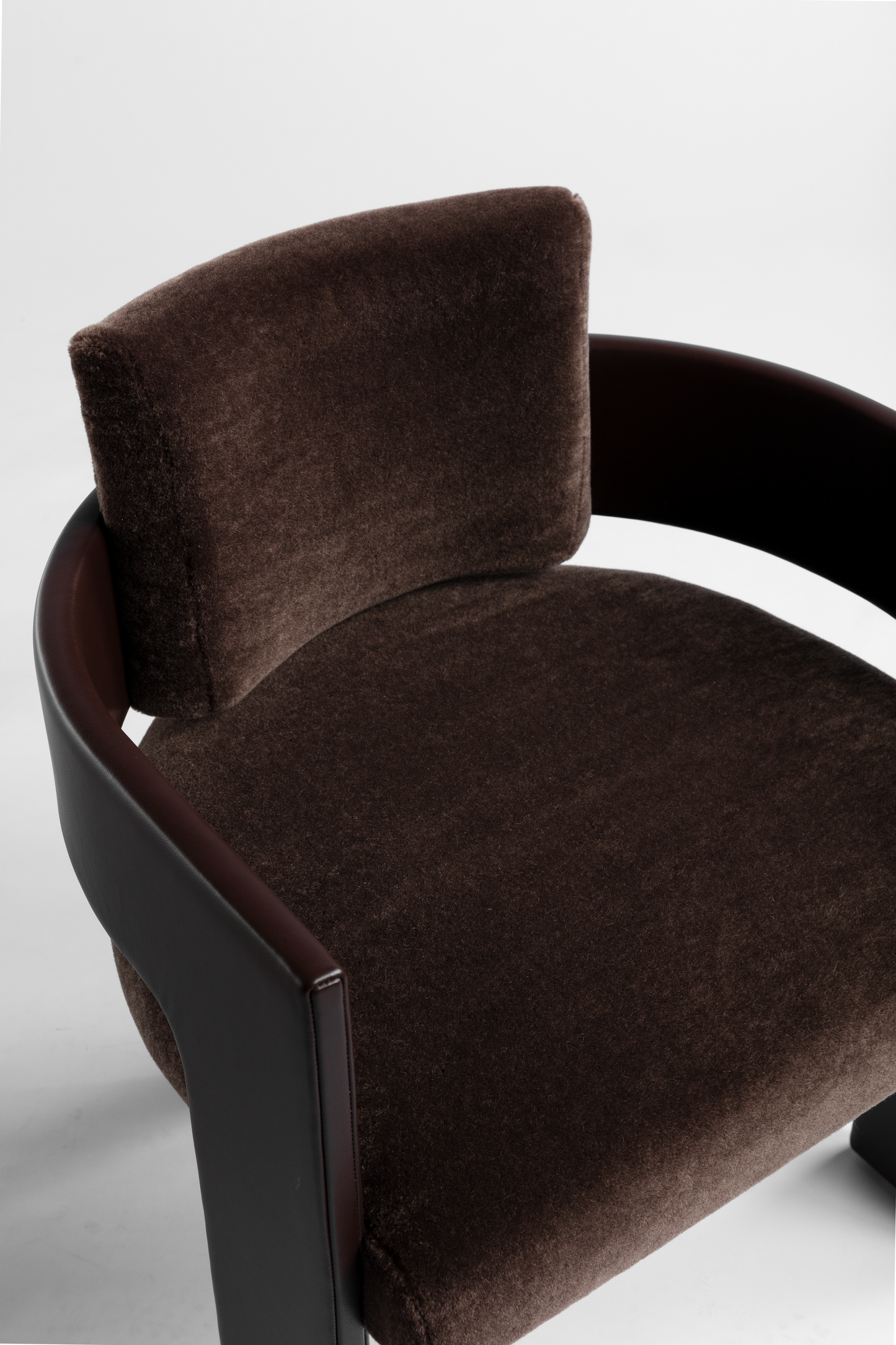 Shown in Chocolate Leather frame with Chocolate Mohair cushions