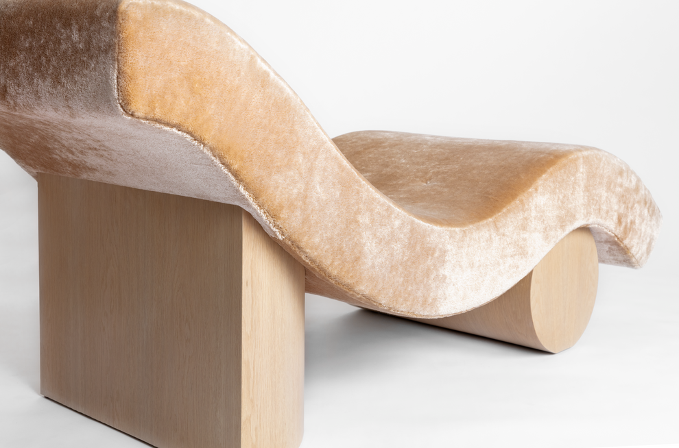 Shown in Natural Oak base with fabric from Dedar