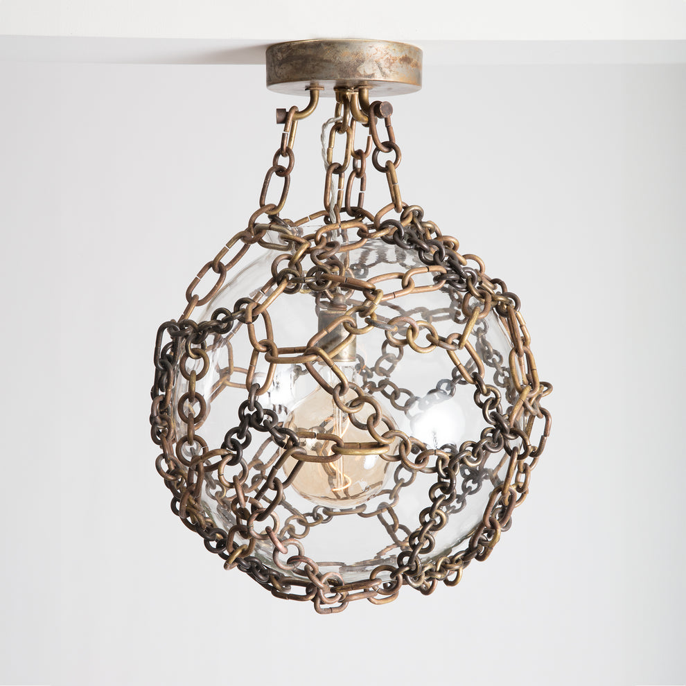 Shown in Unlacquered Brass chain and canopy